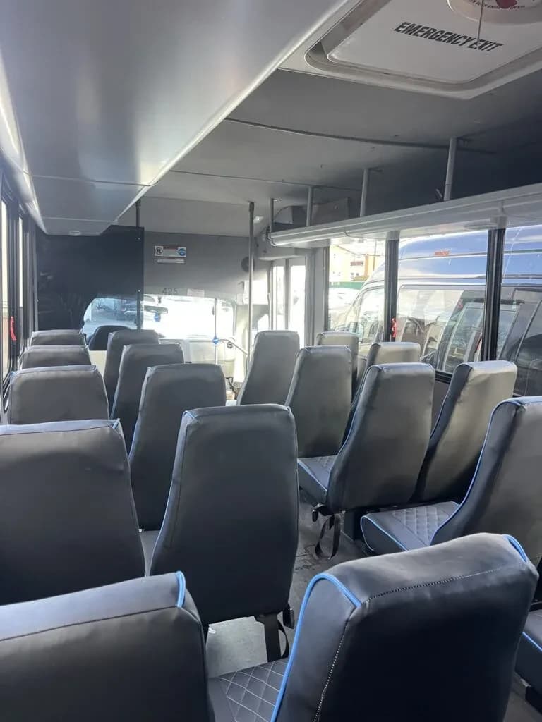 29-passenger mini coach interior rear-to-front view