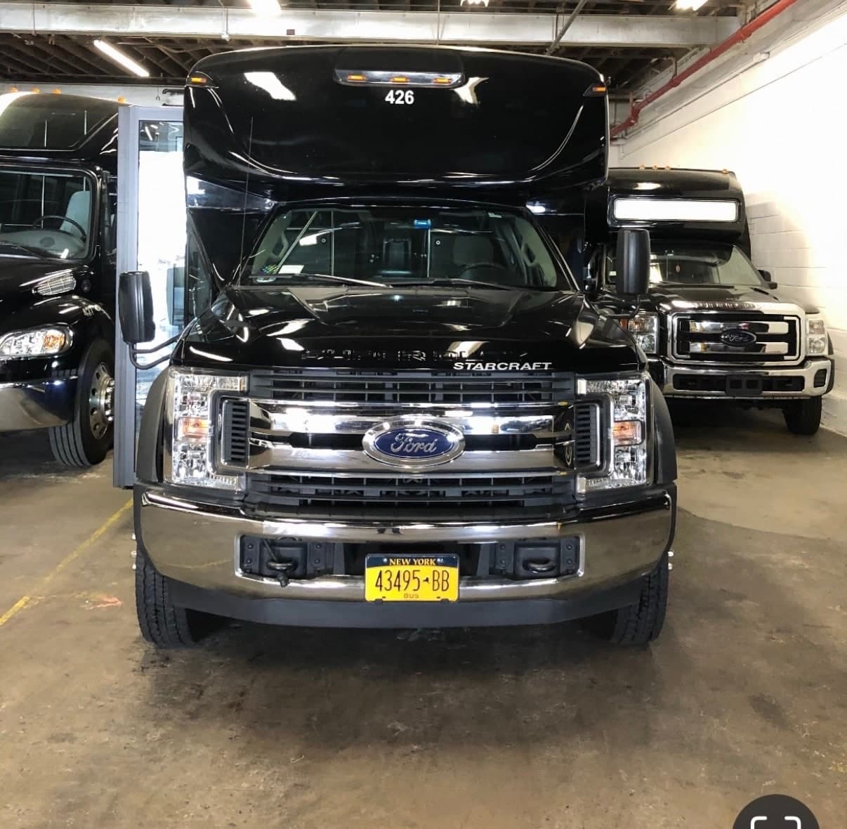 Mini coach exterior—representative of our 24-passenger class