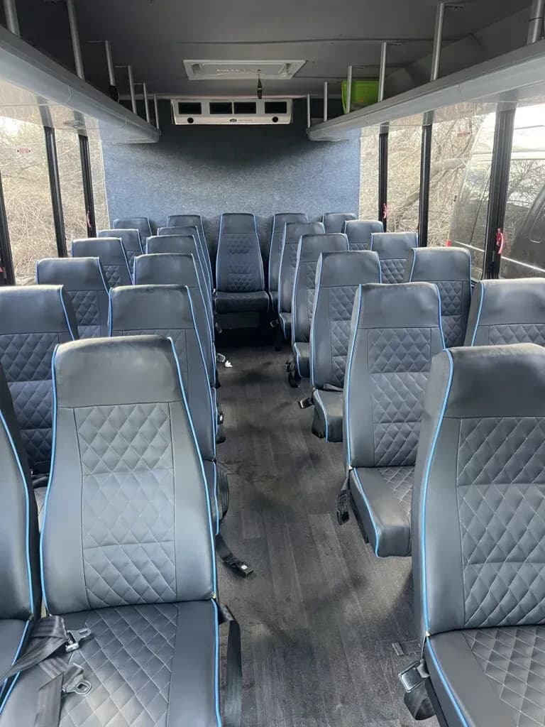 29-passenger mini coach interior aisle and seating