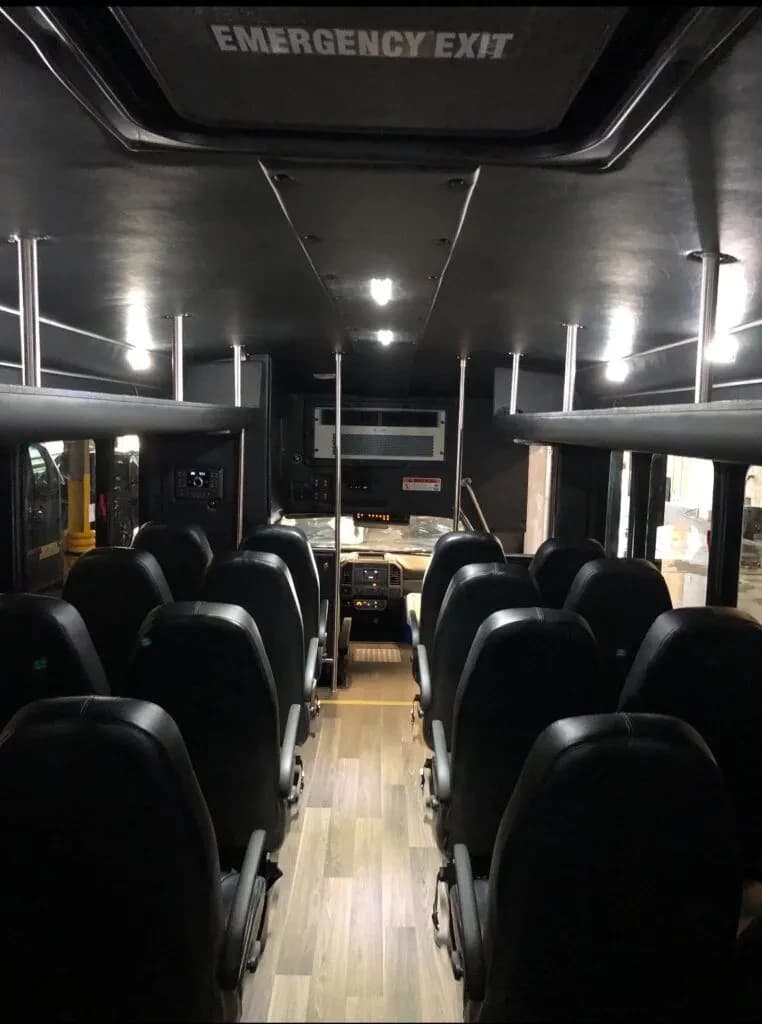 36-passenger mini coach cabin—coach-class seating without a full-size bus footprint